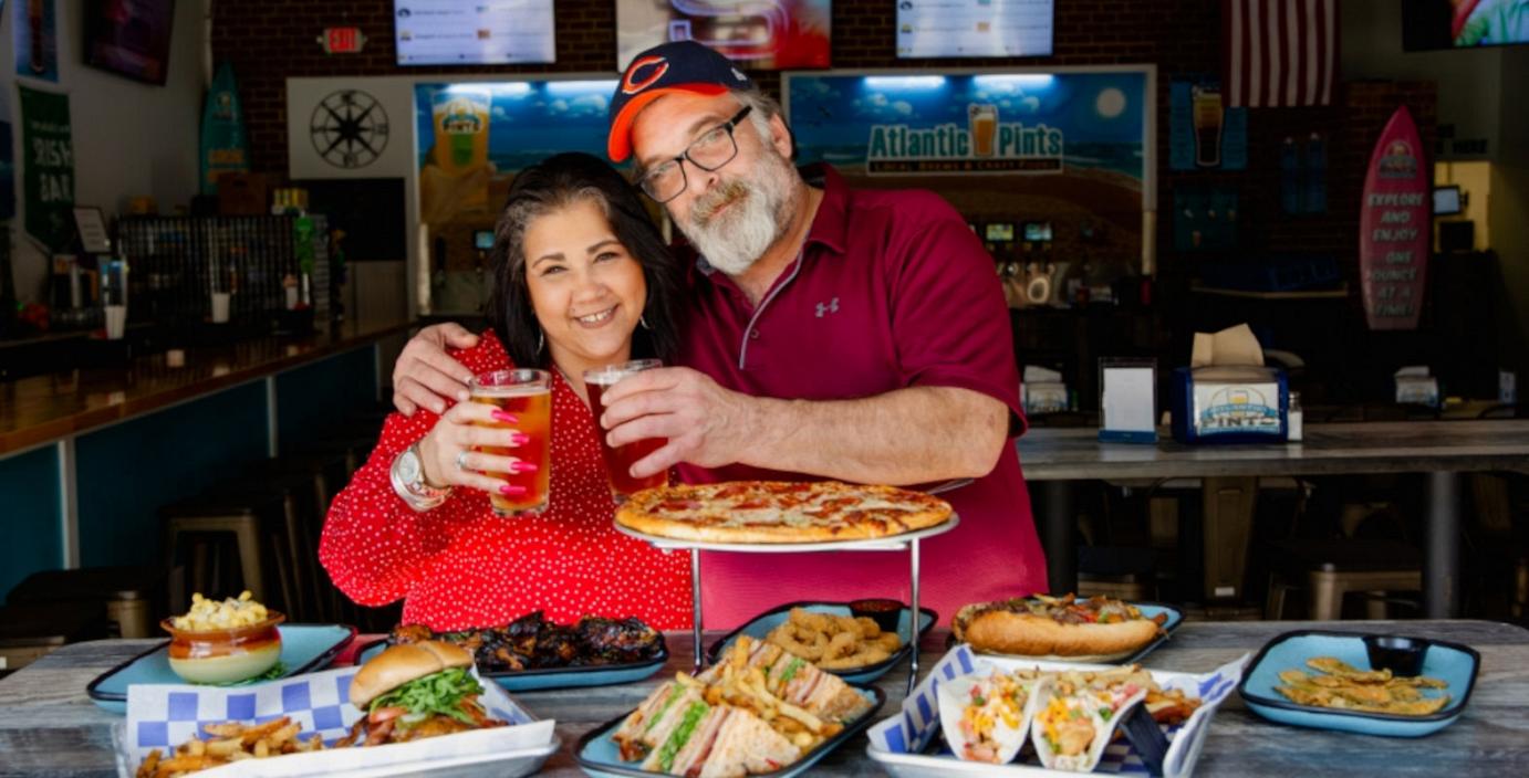 Two people posing for a picture